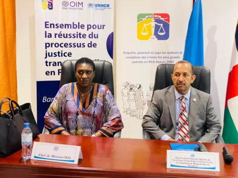 LE COORDONATEUR RESIDENT ET LA CHEFFE DE MISSION OIM